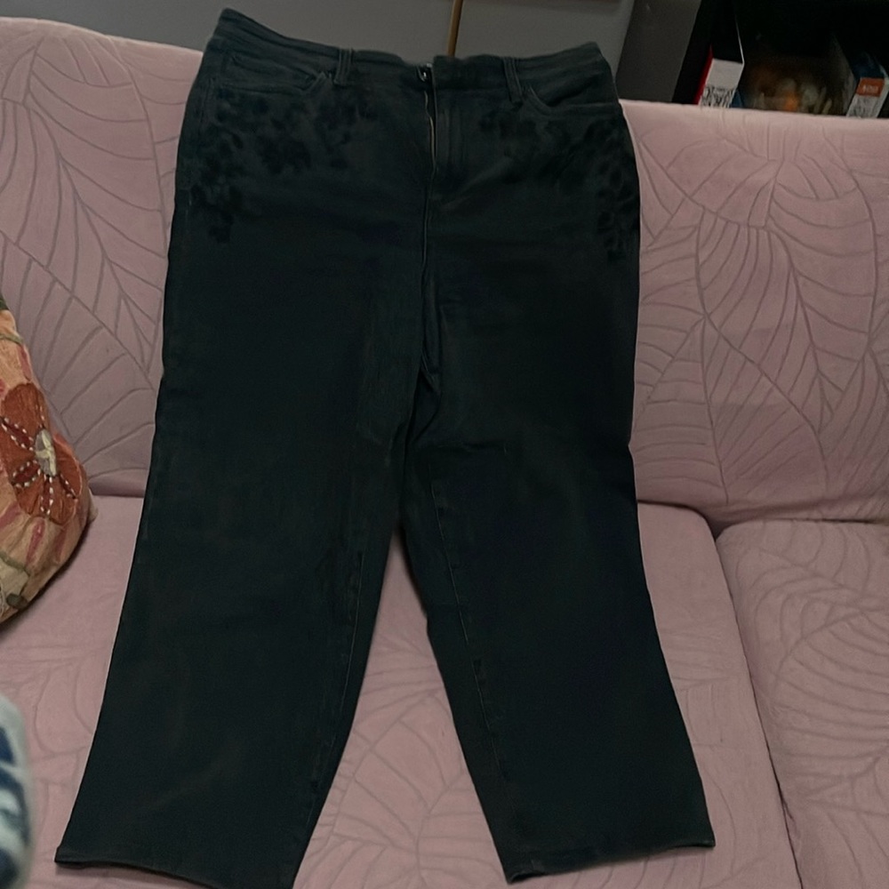 High rise straight boyfriend style jeans with floral embroidery on the waist